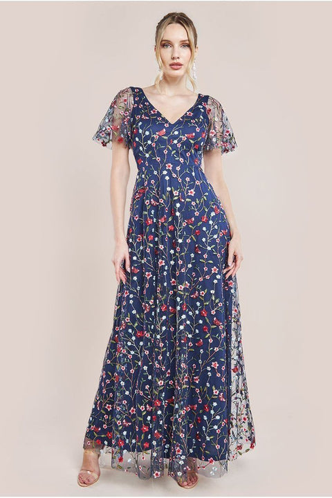 Navy Floral Embroidered Flutter Sleeve Maxi Dress by Goddiva